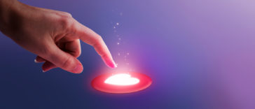 finger pressing heart button