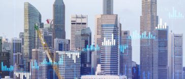 holographic stock charts with city backdrop