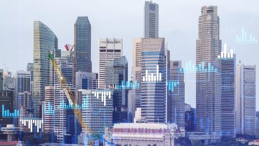 holographic stock charts with city backdrop