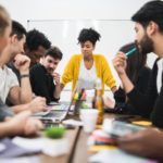 manager woman leading brainstorming meeting